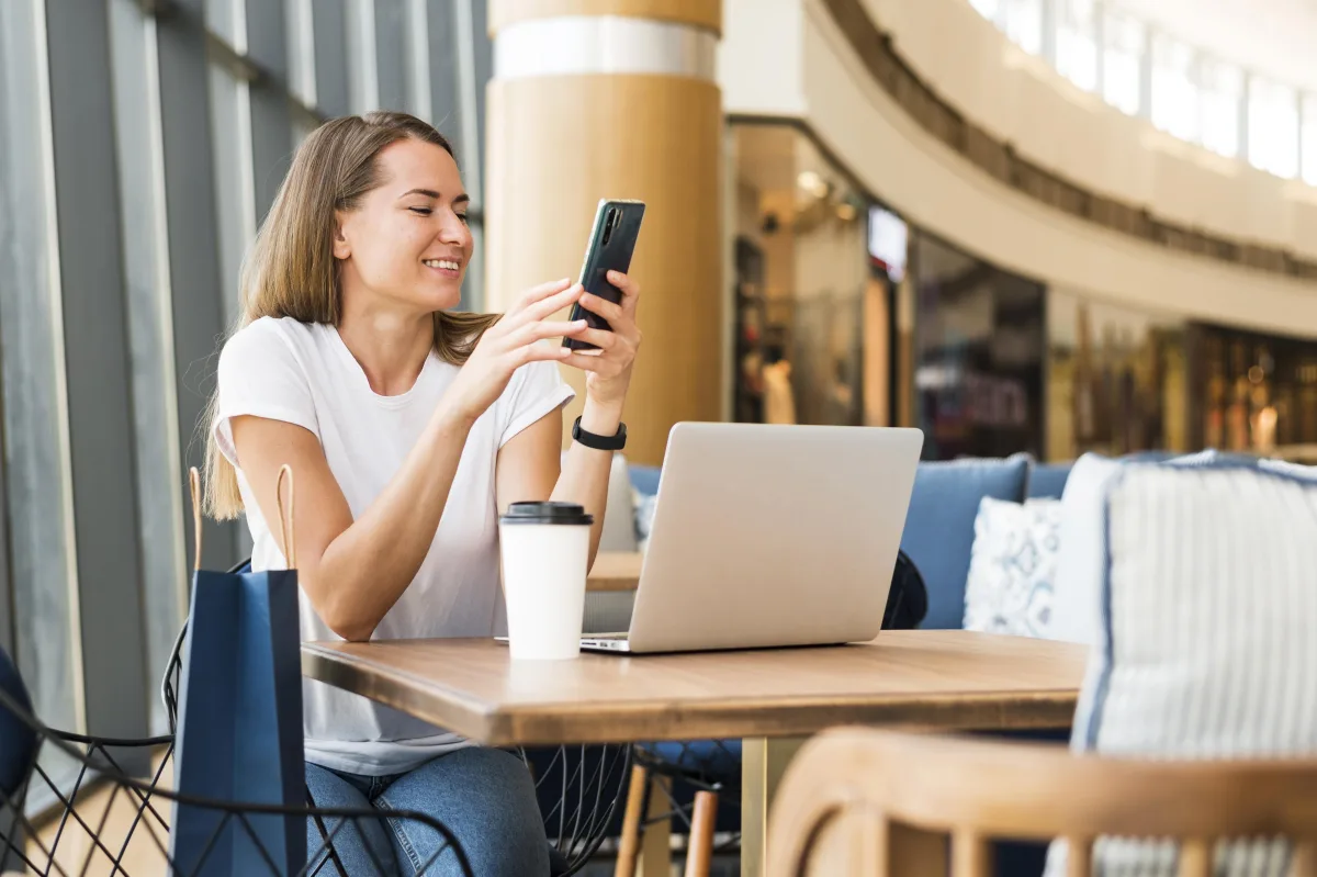 Woman using mobile phone on public WiFi - security risks illustration
